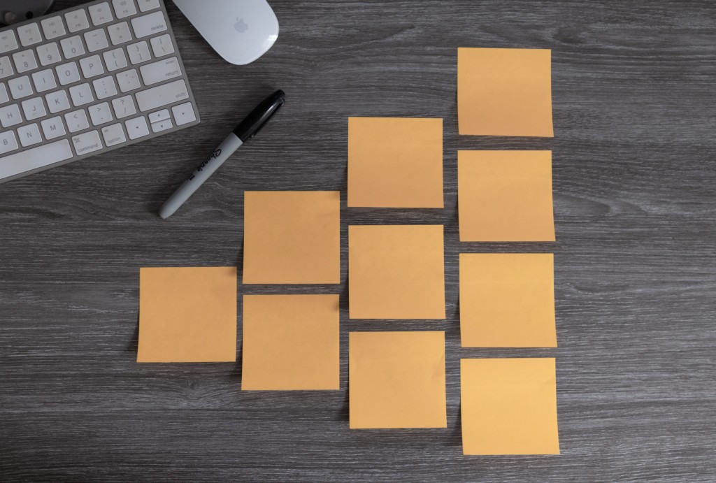 Orange Post-its on a table