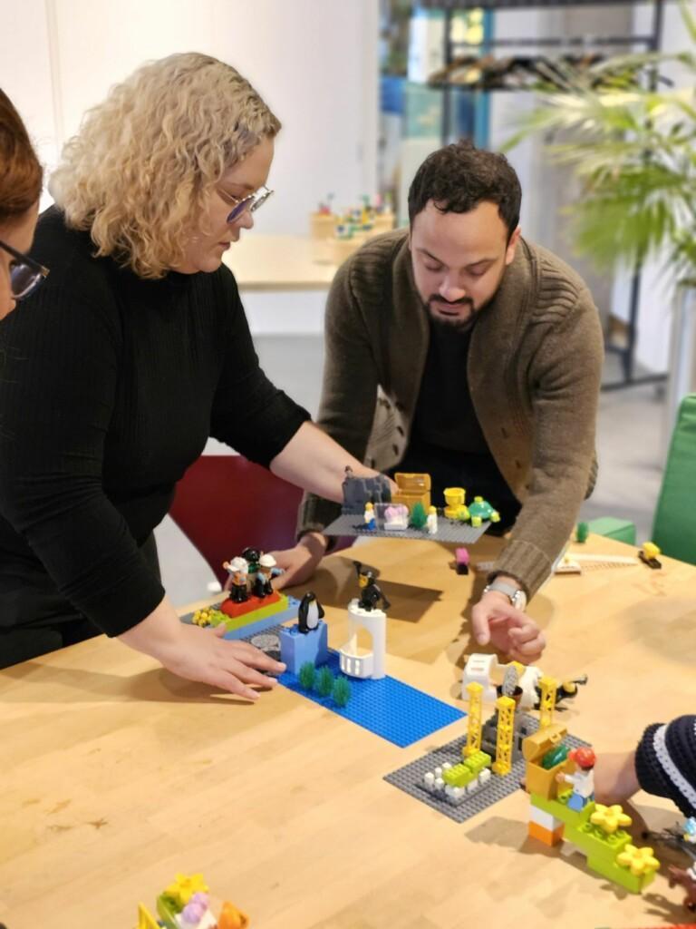 Lego Serious Play workshop, two people building on legos